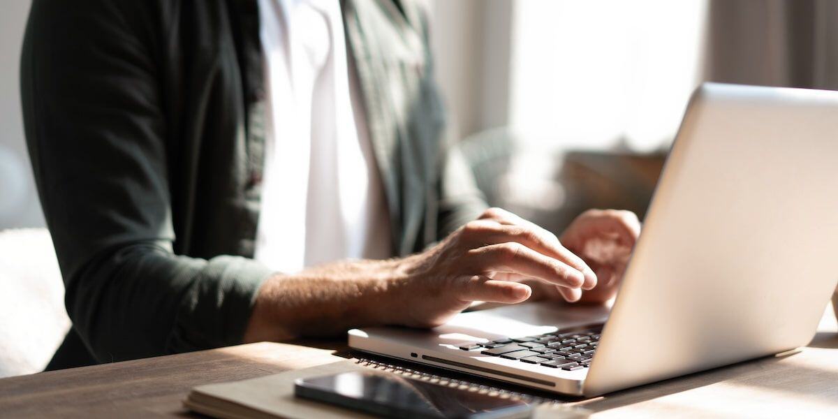 Person using a laptop to work